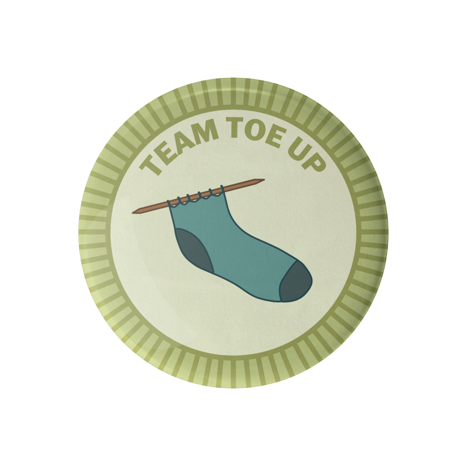 Team Toe Up Merit Badge Enamel Pins by Mountaintop Yarn