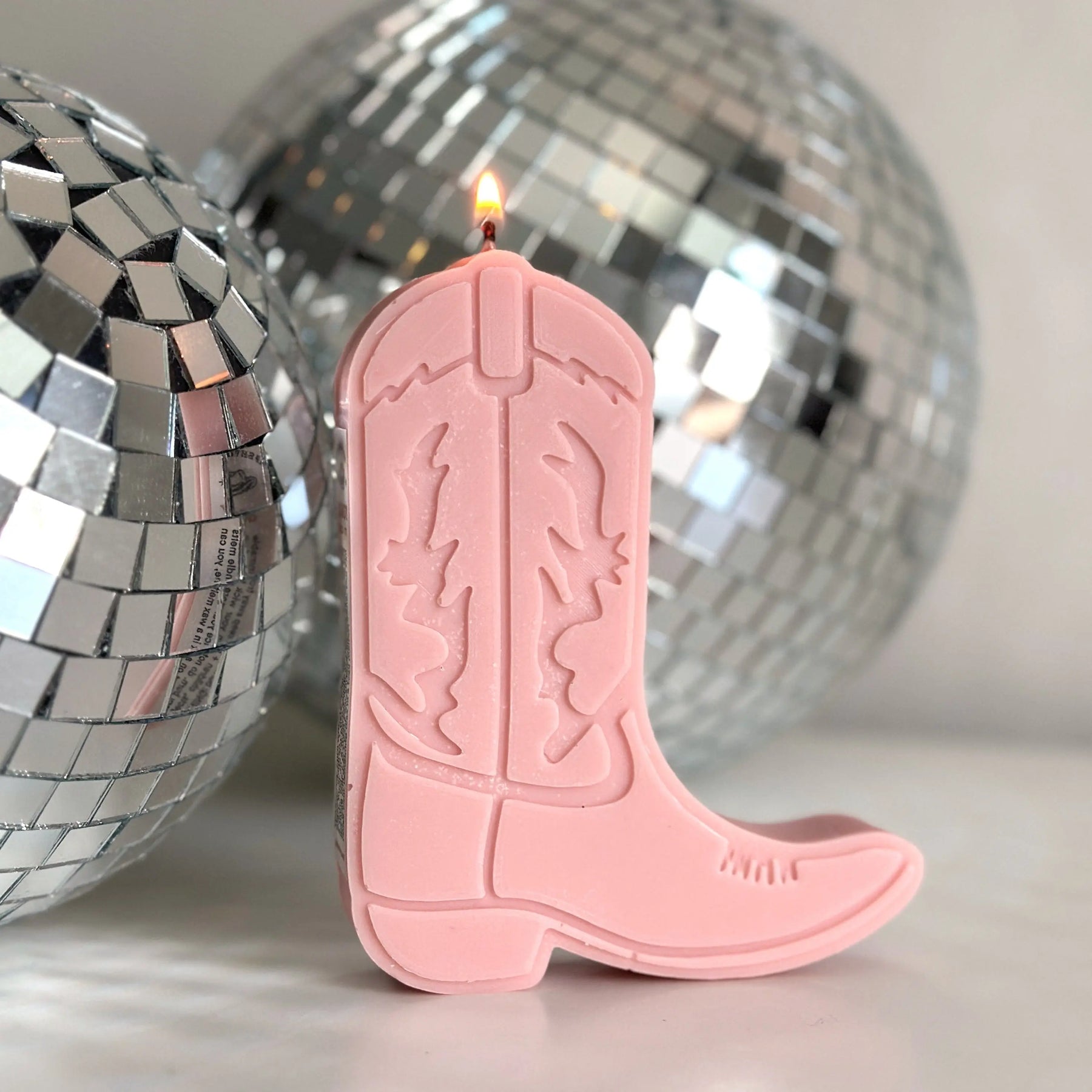 Cowboy boot shape candles by gold + ivy, scented candle detail photo 2