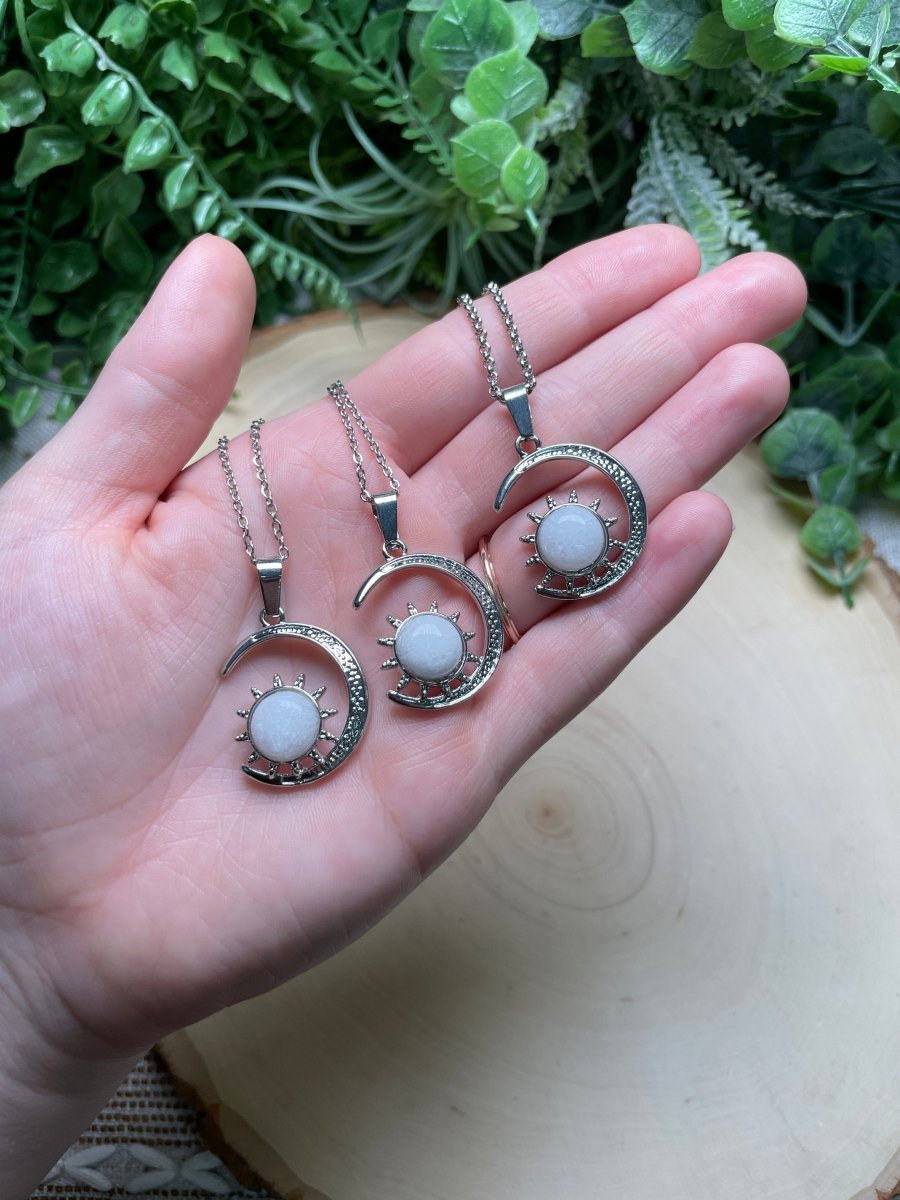 Crystal Moon and Sun Necklace detail view by Copper Ashes