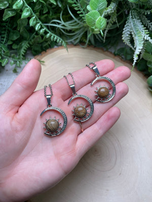 Crystal Moon and Sun Necklace detail view by Copper Ashes