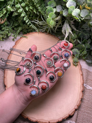 Crystal Moon and Sun Necklace detail view by Copper Ashes