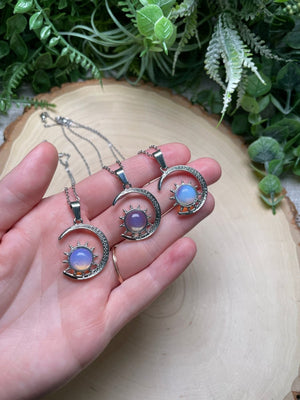 Crystal Moon and Sun Necklace detail view by Copper Ashes