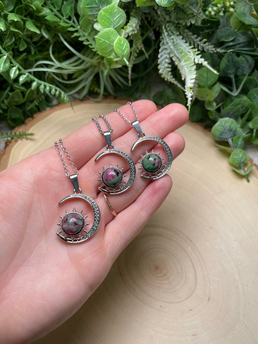 Crystal Moon and Sun Necklace detail view by Copper Ashes