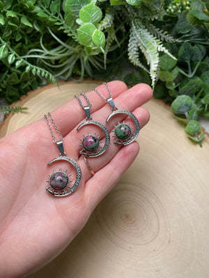 Crystal Moon and Sun Necklace detail view by Copper Ashes