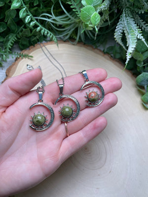 Crystal Moon and Sun Necklace by Copper Ashes