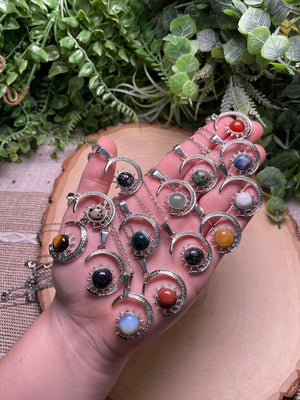 Crystal Moon and Sun Necklace detail view by Copper Ashes