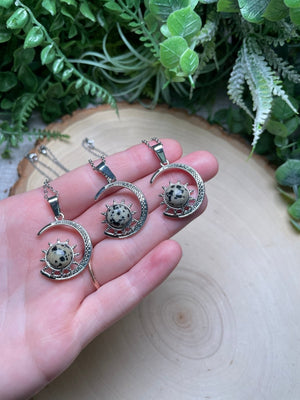 Crystal Moon and Sun Necklace detail view by Copper Ashes