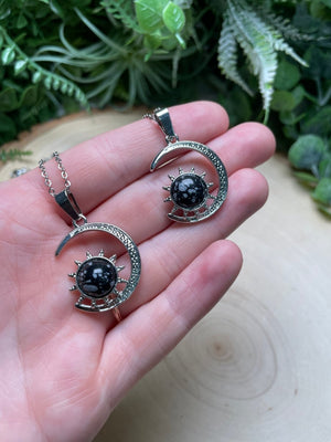 Crystal Moon and Sun Necklace detail view by Copper Ashes