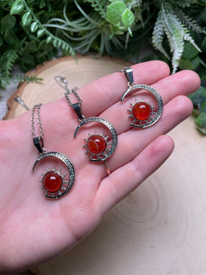 Crystal Moon and Sun Necklace detail view by Copper Ashes