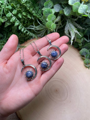 Crystal Moon and Sun Necklace detail view by Copper Ashes