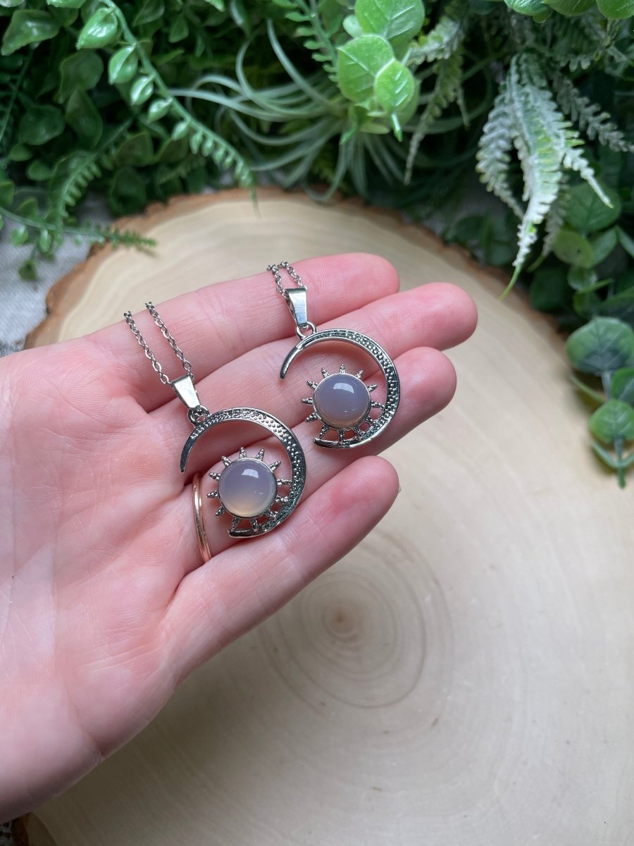 Crystal Moon and Sun Necklace detail view by Copper Ashes