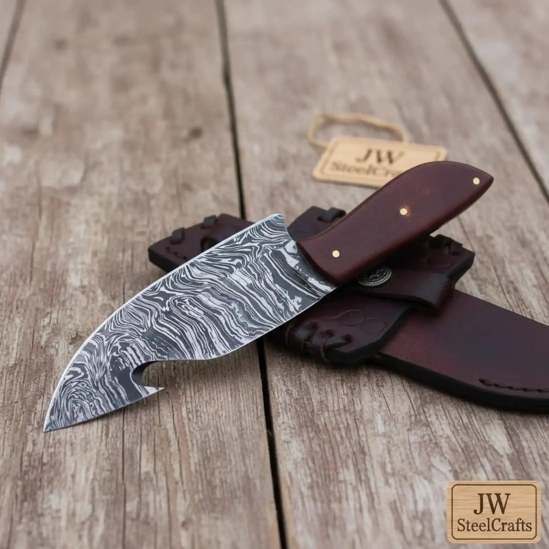 Damascus Steel Gut Hook Knife with Brown Micarta Handle detail view by JW SteelCrafts