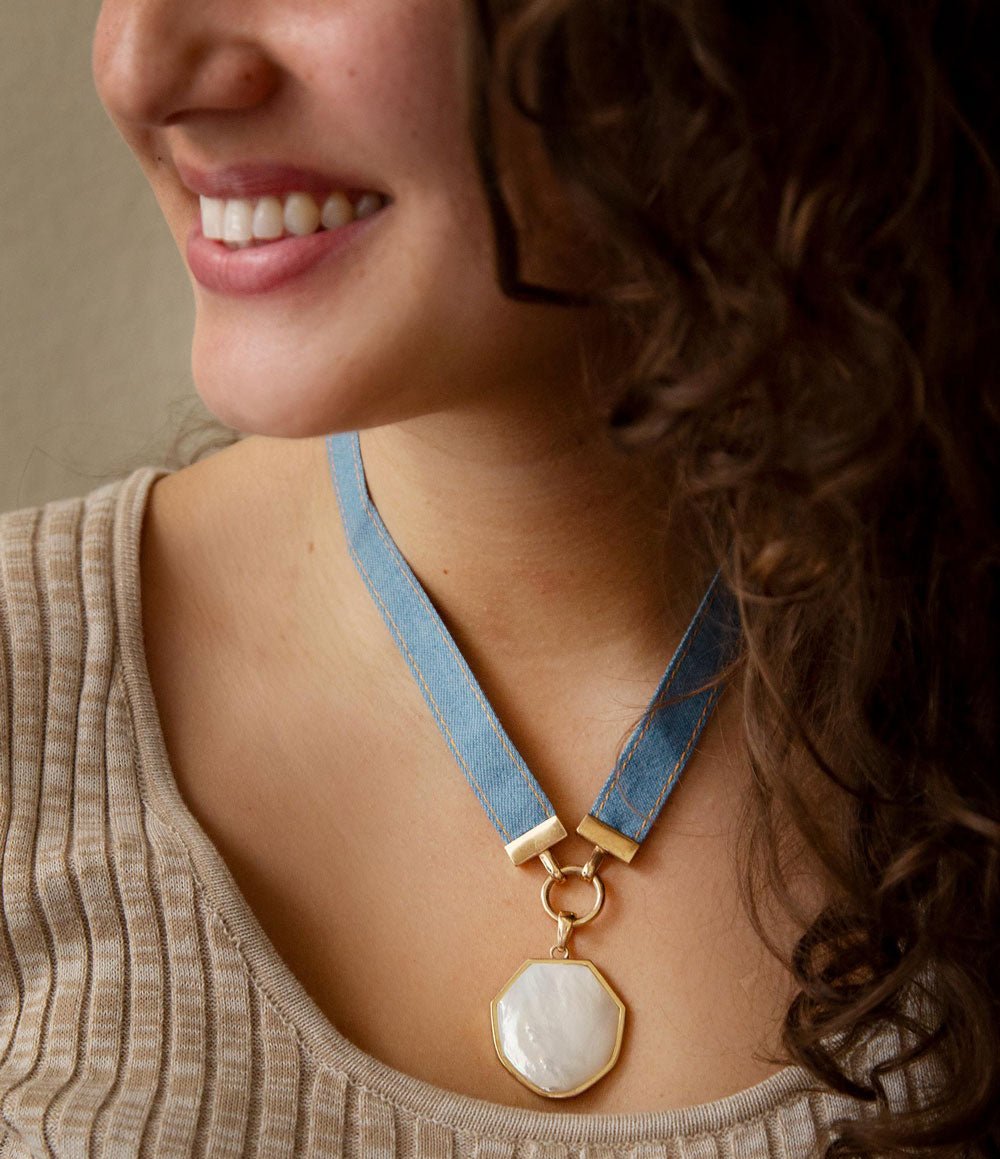 Blue Denim Dreams White Mother of Pearl Ribbon Golden Pendant Necklace detail view by Barse Jewelry