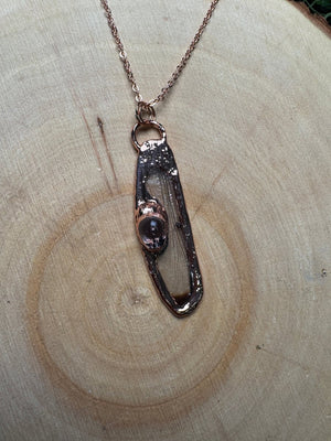 Dragonfly Wing and Resin Face Necklace detail view by Copper Ashes