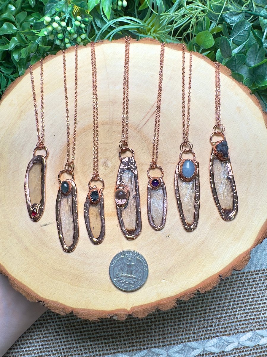 Dragonfly Wing and Resin Face Necklace detail view by Copper Ashes