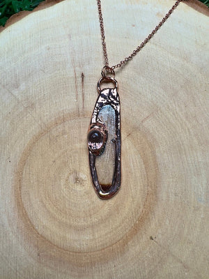 Dragonfly Wing and Resin Face Necklace detail view by Copper Ashes