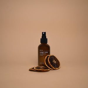 Orange + clove room spray by gold + ivy, scented candle detail photo 2