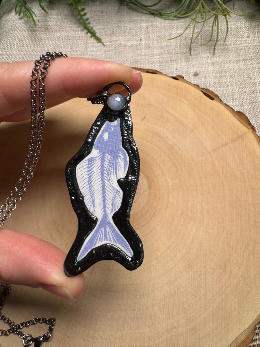 Fish Skeleton and Moonstone Necklace detail view by Copper Ashes