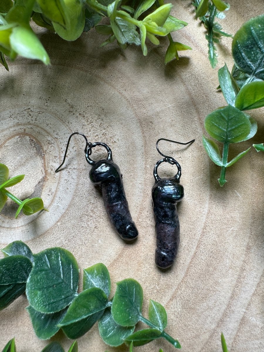 Garnet in Astrophyllite Penis Earrings detail view by Copper Ashes