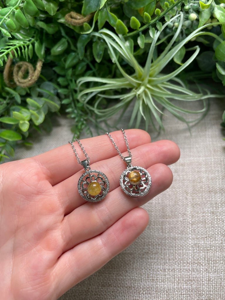 Gold Rutile Quartz Fidget Spinner Necklace detail view by Copper Ashes