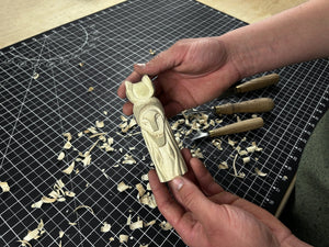 Hand-Carved Loki Figurine – 14 cm (5.7 inches) Wooden Norse God of Mischief Statue detail view by Sharky Forged Steel Tools