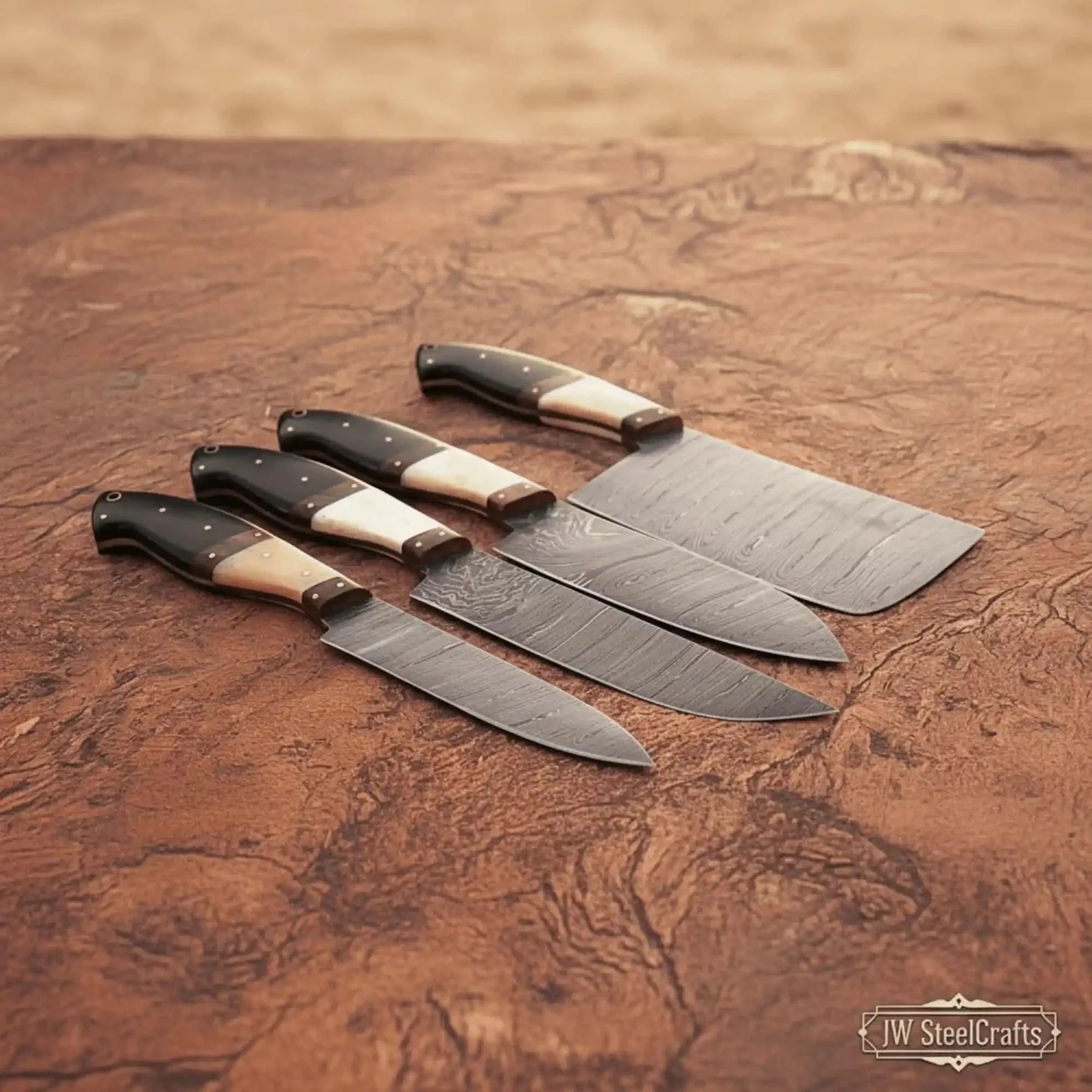 4-piece high-carbon Damascus butcher knife set – bone and horn handle with brass pins by JW SteelCrafts, Damascus knife main product photo