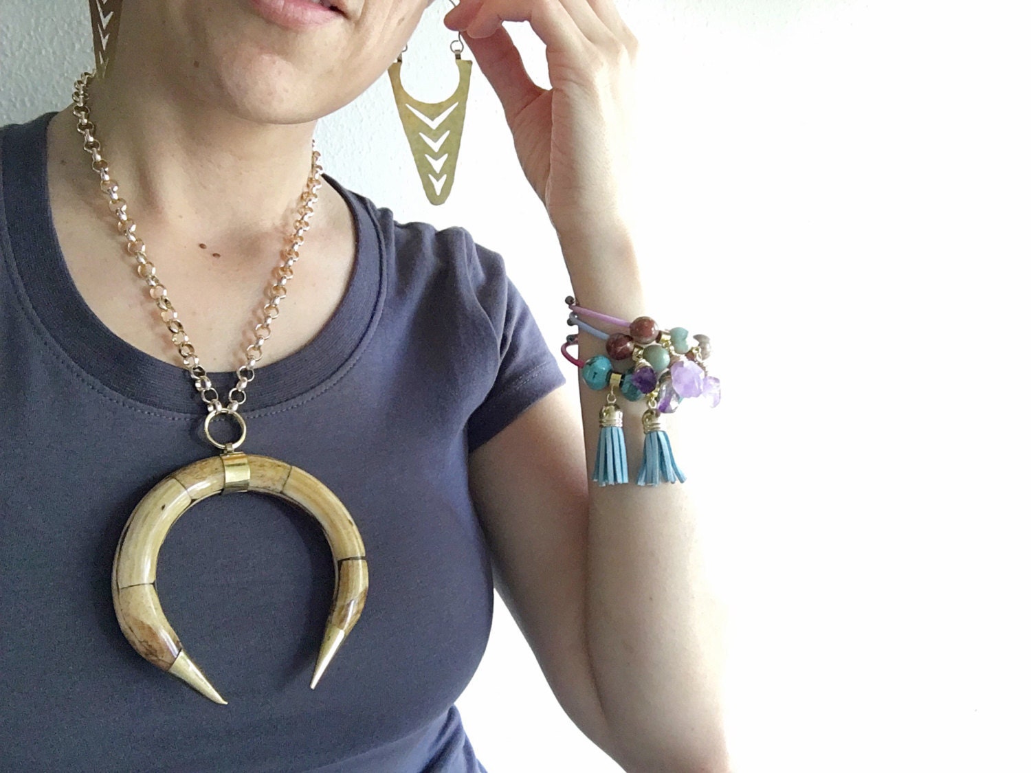 La Fletcha hoop earrings, metalwork arrow hoops, geometric jewelry, sculptural earrings