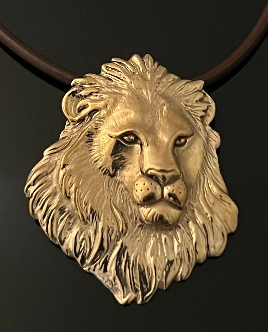 Bronze Lion Pendant on Leather Cord by Anisa Jewelry