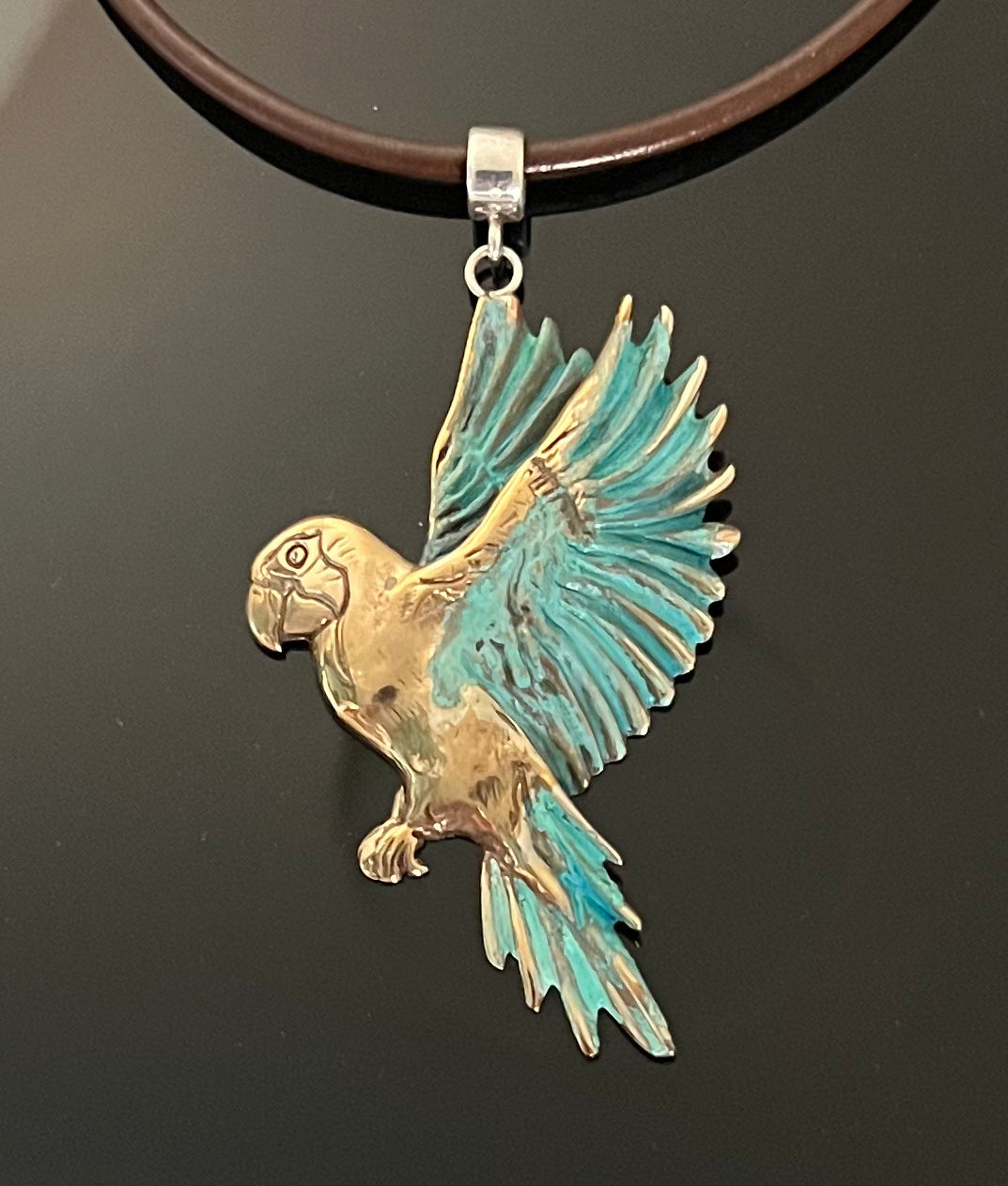 Bronze Macaw Pendant with Verde Patina by Anisa Jewelry