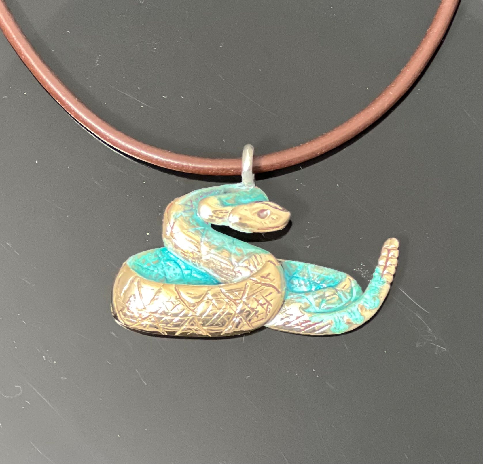 Bronze Rattlesnake Pendant with Verde Patina by Anisa Jewelry