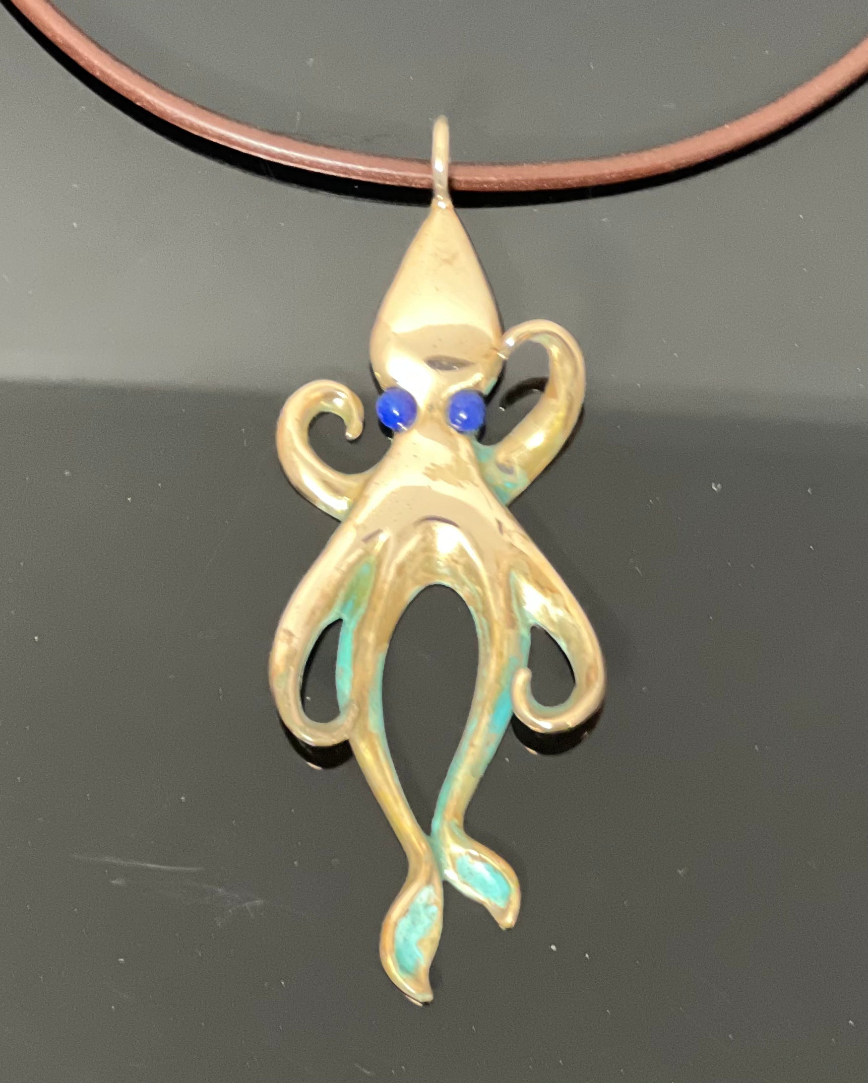 Large Bronze Squid Pendant with Lapis Eyes and Green Patina by Anisa Jewelry
