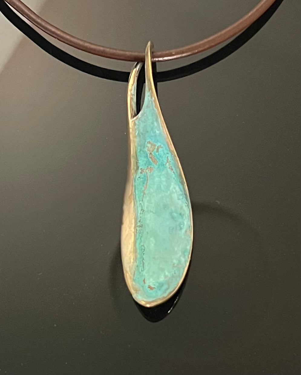 Bronze Wave Pendant with Verde Patina by Anisa Jewelry
