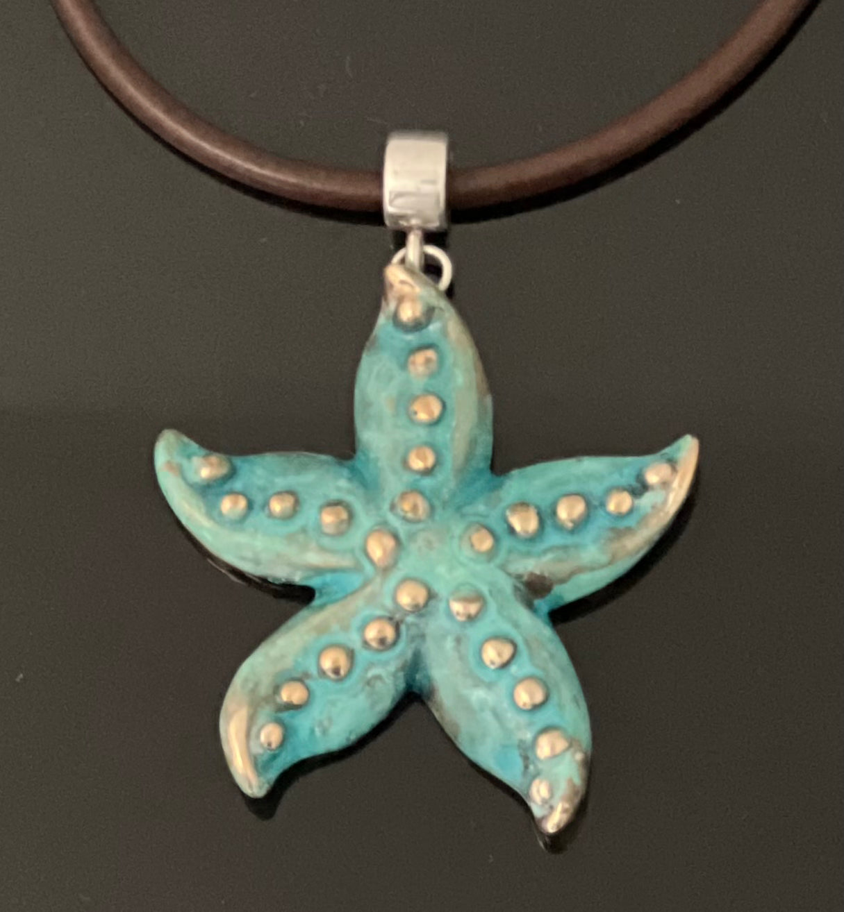 Bronze Starfish Pendant with Verde Patina by Anisa Jewelry