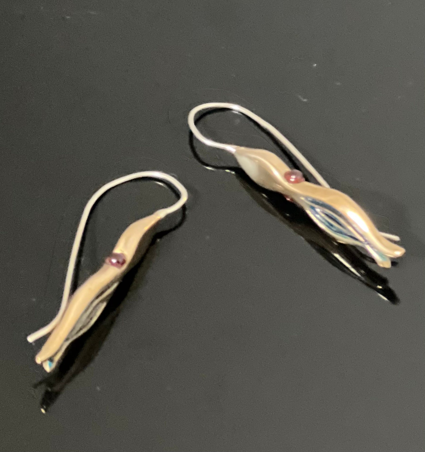 Bronze Squid Earrings with Blue Patina and Garnet Eyes by Anisa Jewelry