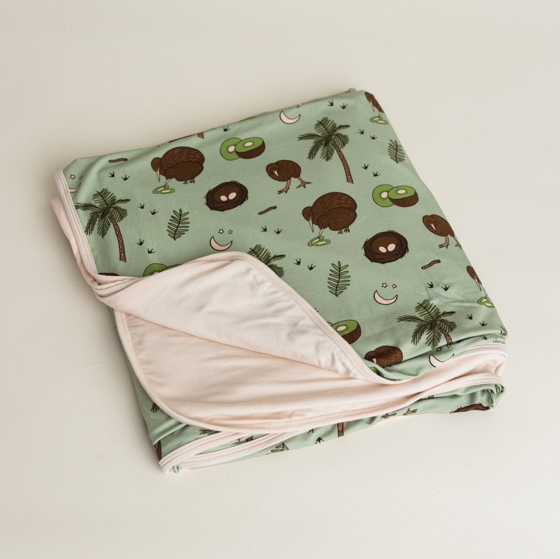 Kiwi Bird reversible bamboo blanket with hand drawn animal print
