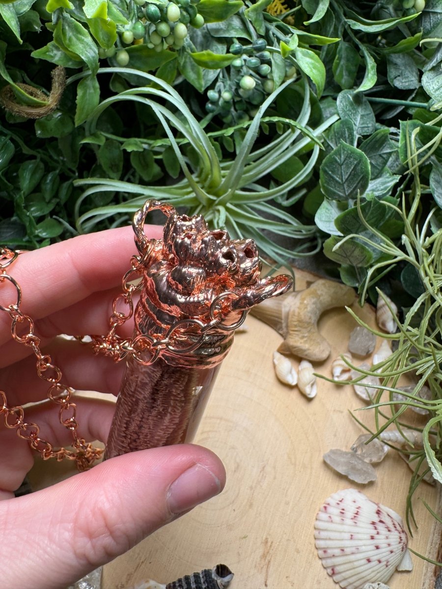 Labradorite, Barnacles, and Starfish Arm Oddity Vial Necklace detail view by Copper Ashes