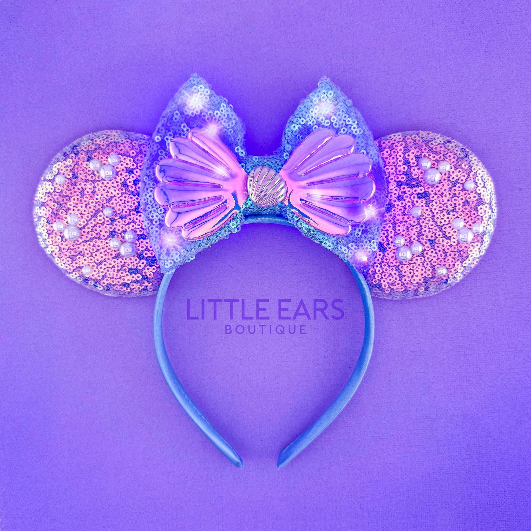 Light Up Mermaid Shells Ears by Little Ears Boutique, travel planning service main product photo