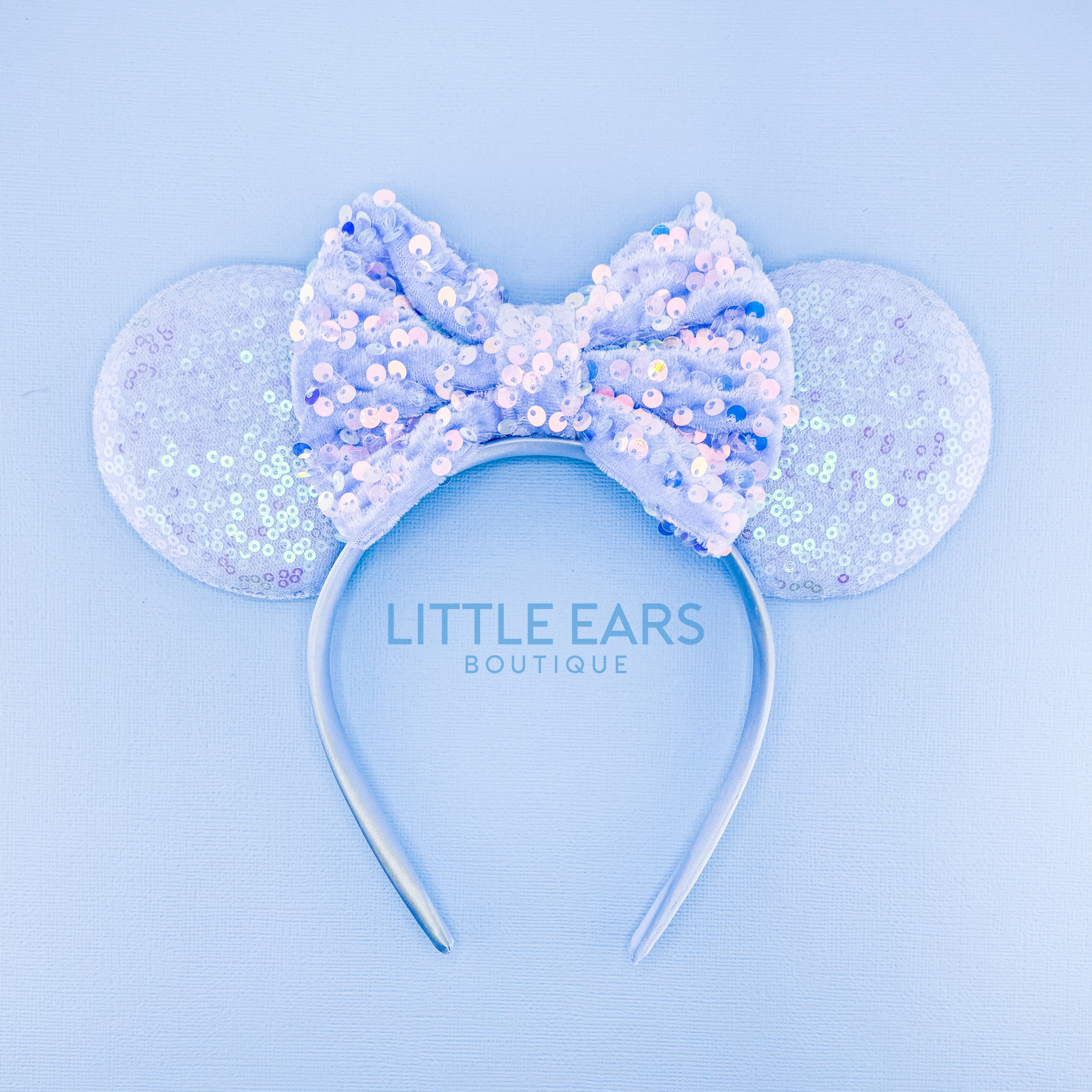 Blue Sequin Ears by Little Ears Boutique, travel planning service main product photo