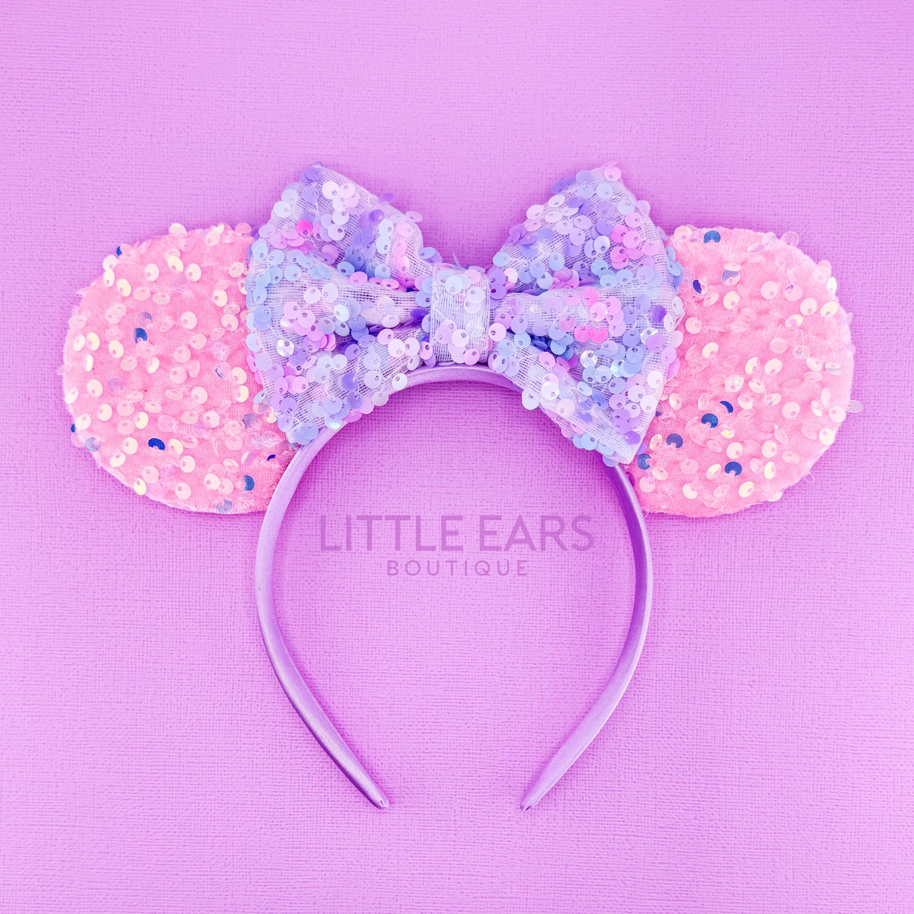 Pink & Purple Sequin Ears by Little Ears Boutique, travel planning service main product photo