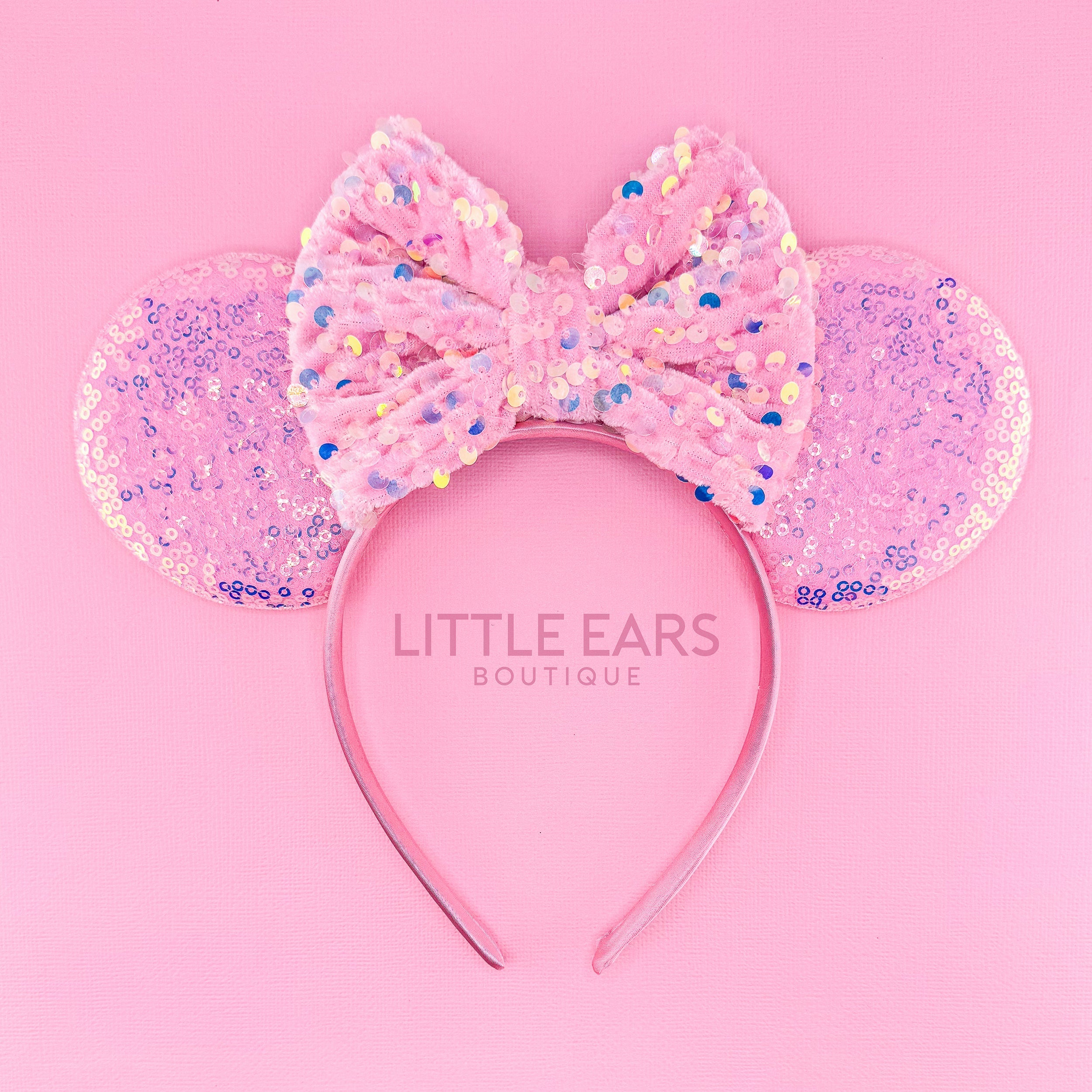 Pink Sequin Ears by Little Ears Boutique, travel planning service main product photo