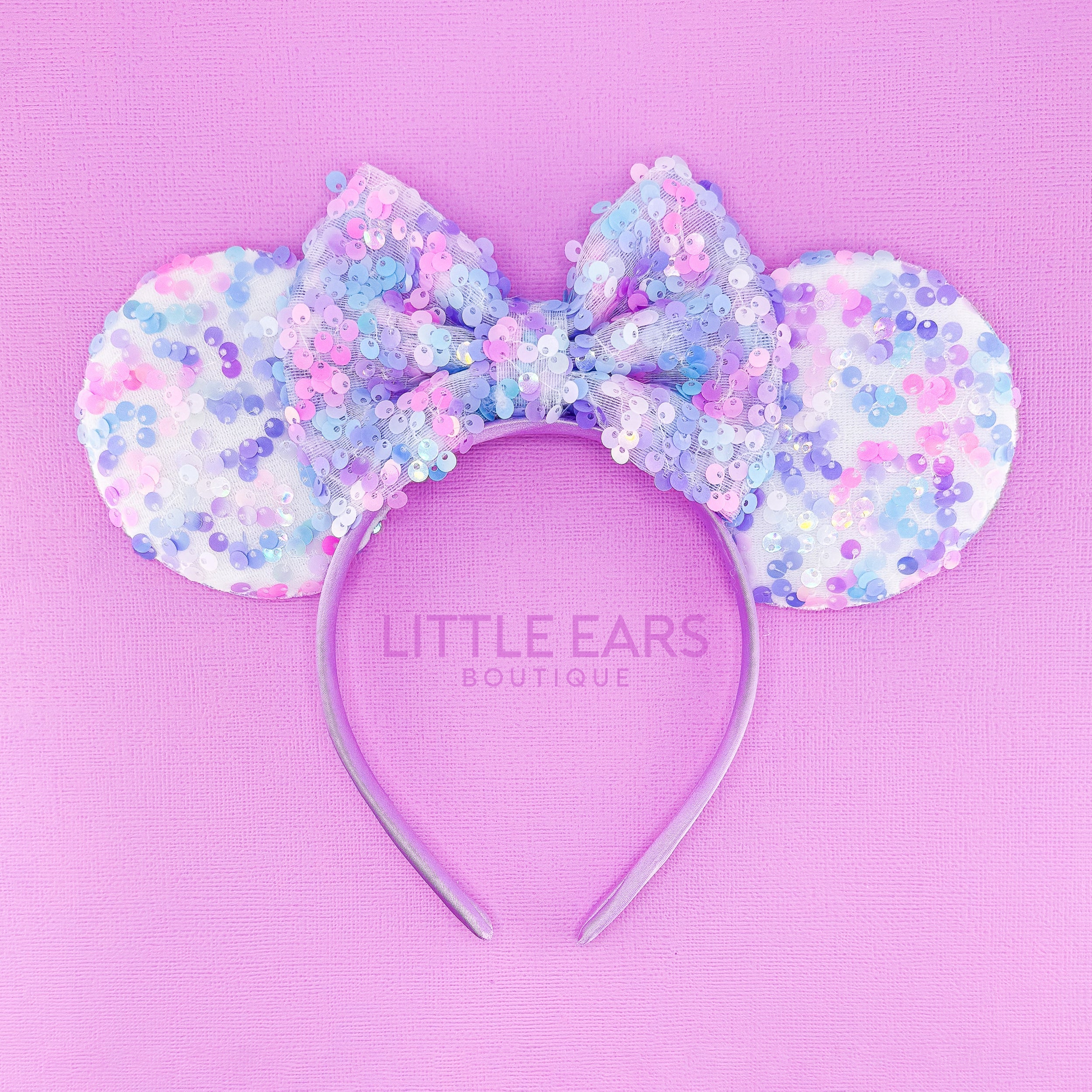 Purple Sequin Ears by Little Ears Boutique, travel planning service main product photo