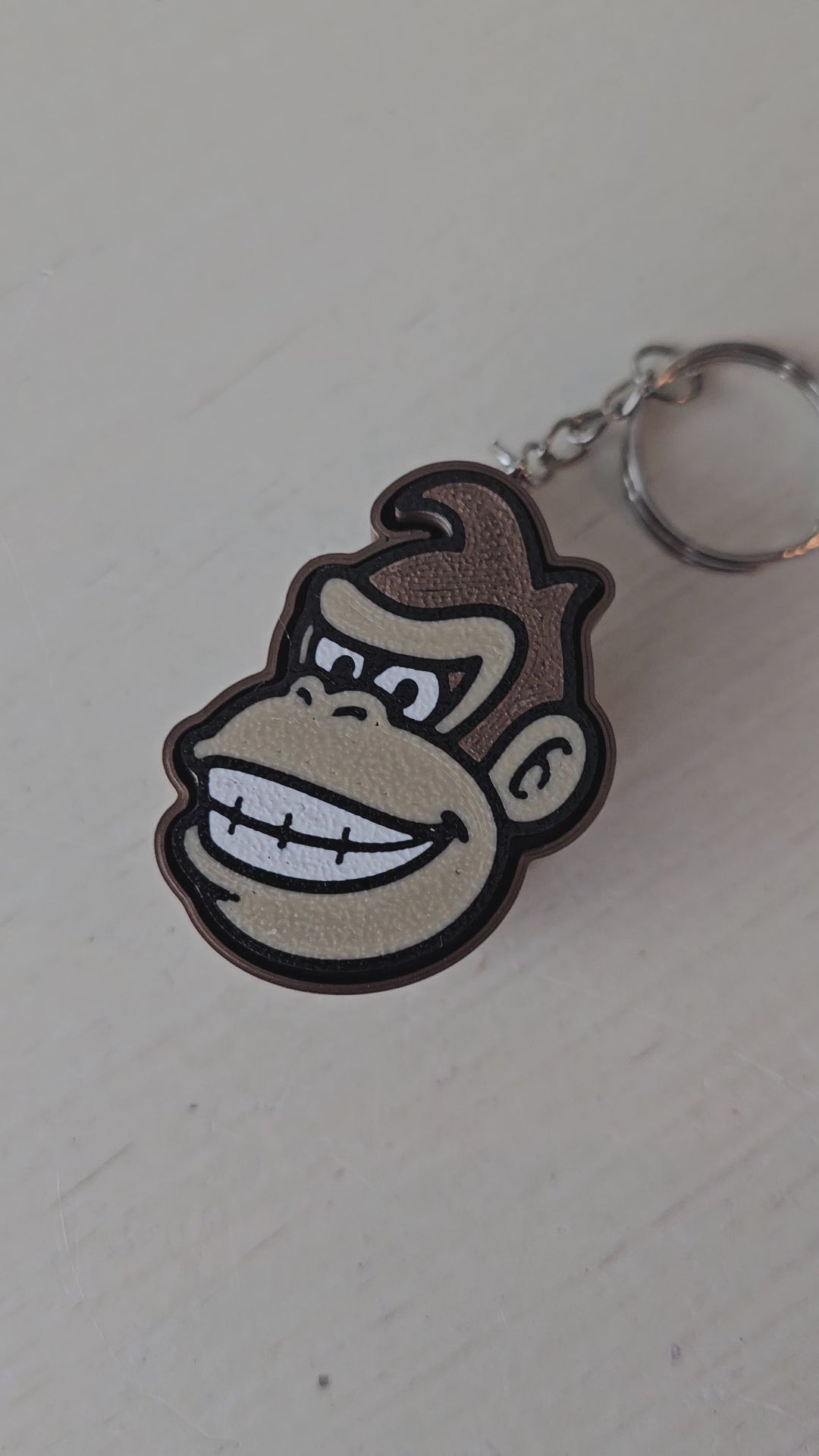 The Tween Space Donkey Kong Inspired Fidget Clicker Keychain | 3D Printed by The Tween Space, paper gift main product photo