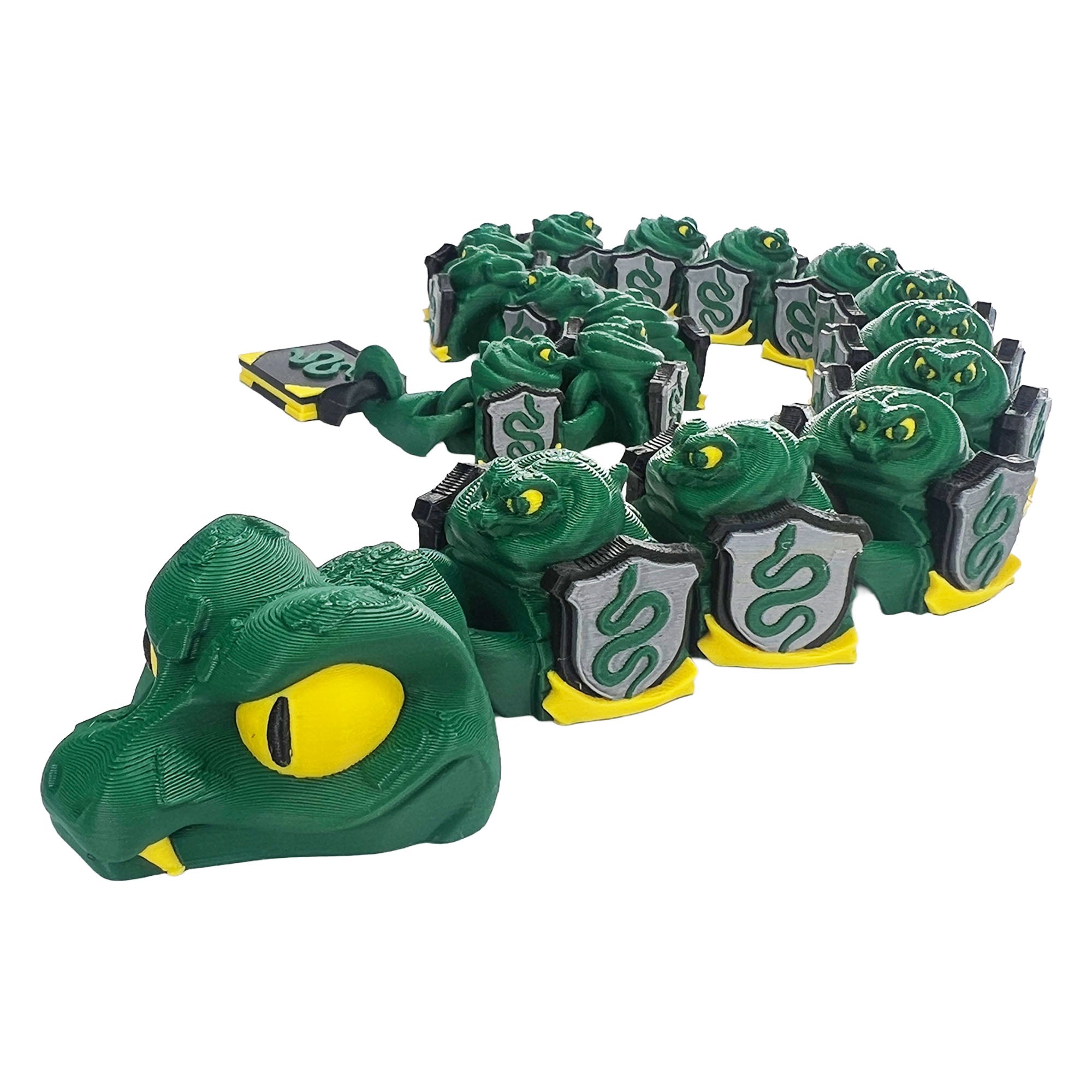 Professor Snake articulated 3D printed serpent with green body, yellow eyes, shields, and book tail