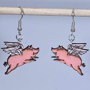 Flying Pig Wooden Dangle Earrings | Realistic Animal Jewelry detail view by Cate's Concepts, LLC
