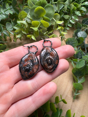 Red Que Sera Yoni Earrings detail view by Copper Ashes