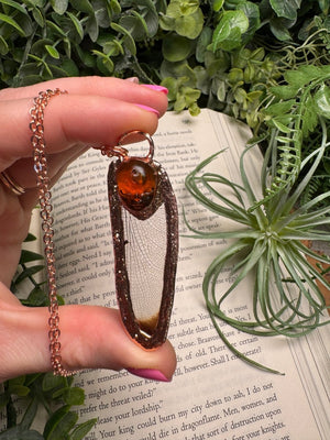 Resin Face and Dragonfly Wing Necklace by Copper Ashes