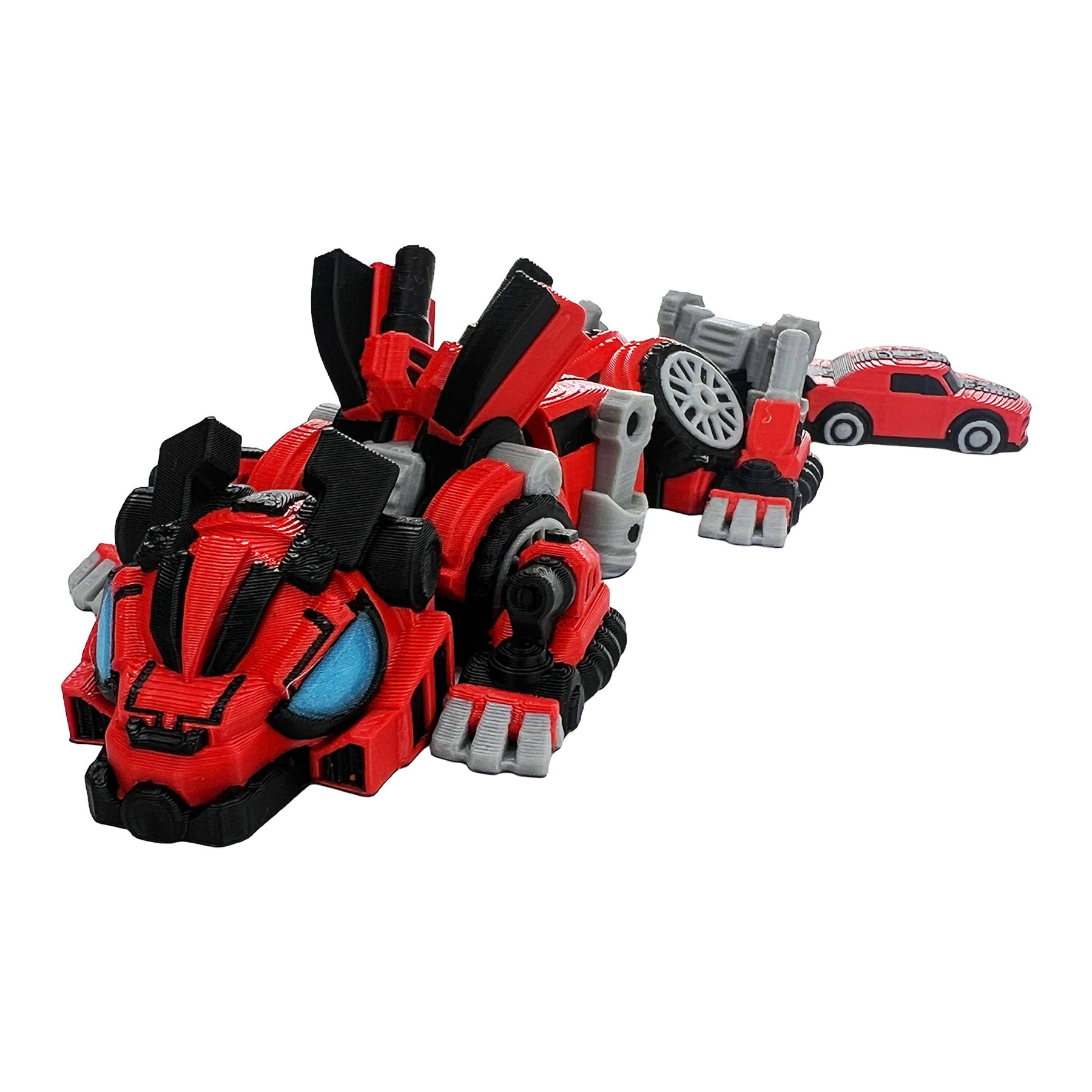 Red articulated robot dragon shown from the front with mechanical armor and car-shaped tail