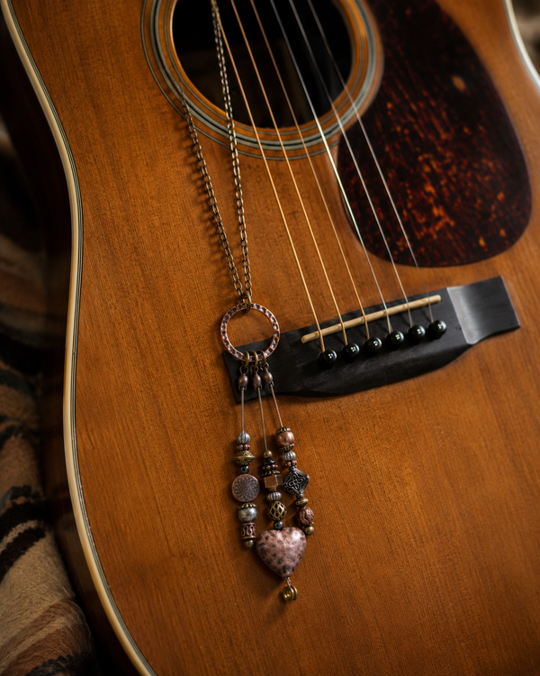 Antiqued Beaded Guitar String Necklace by N Harmony Jewelry, handmade jewelry main product photo