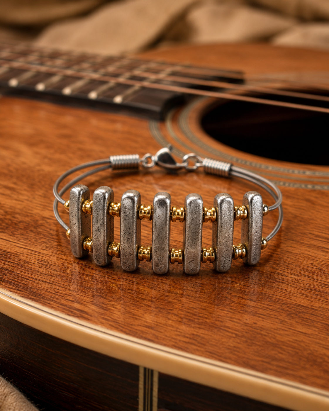 Men's silver and brass guitar string bracelet by N Harmony Jewelry, handmade jewelry main product photo