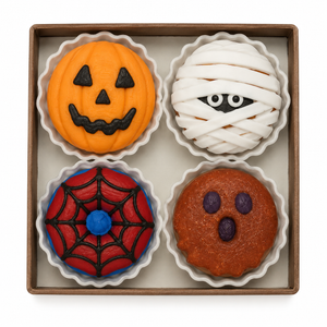 Assorted Halloween donut clicker box with pumpkin, white mummy, spiderweb and ghost fidget toys
